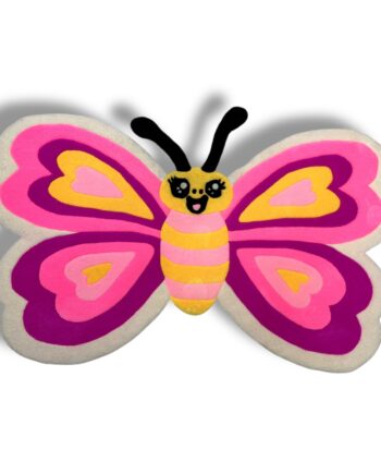 Handmade tufted pink butterfly rug for kids, full front view on floor.