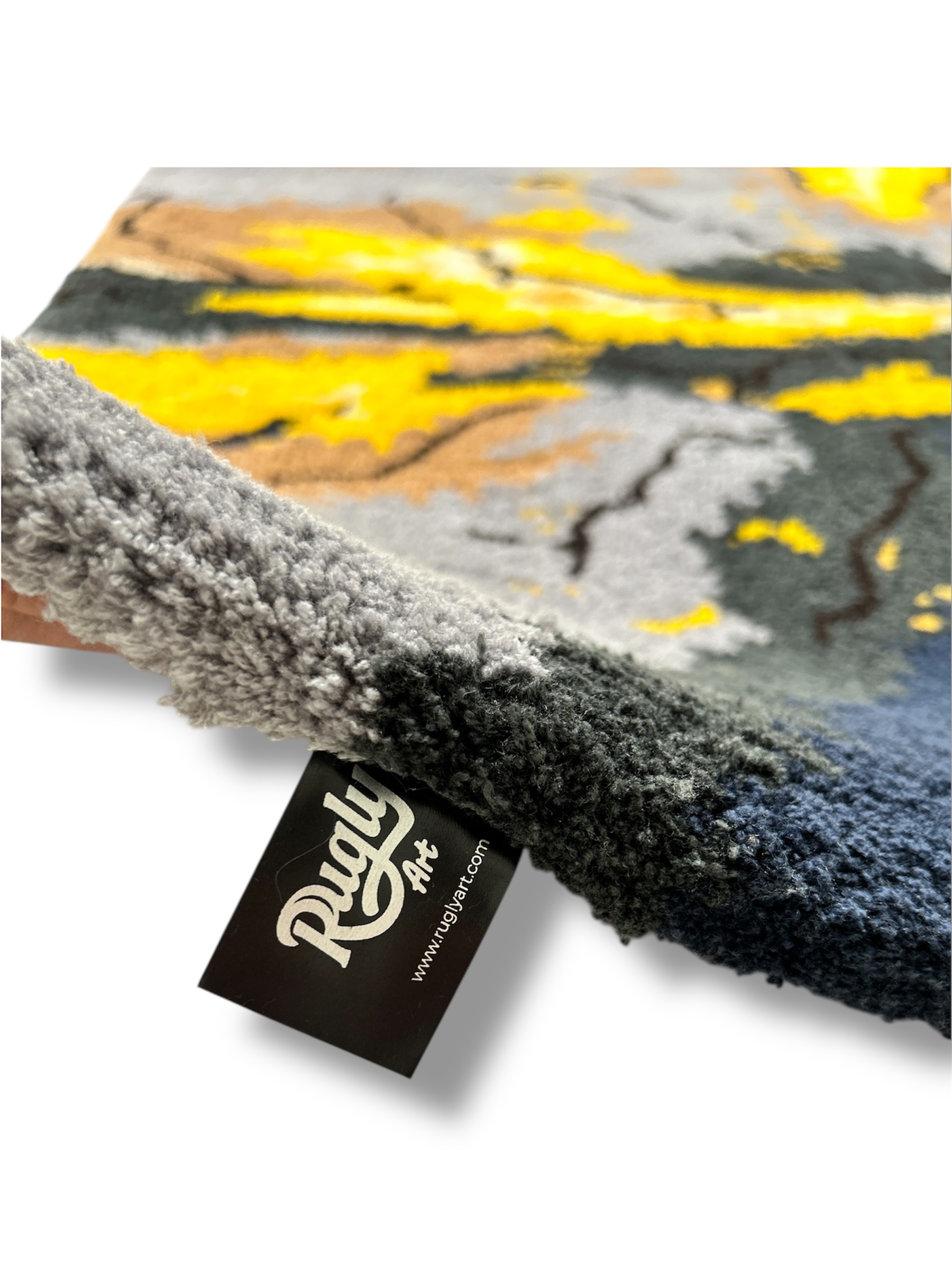 Handmade tufted rug abstract art edge close up view