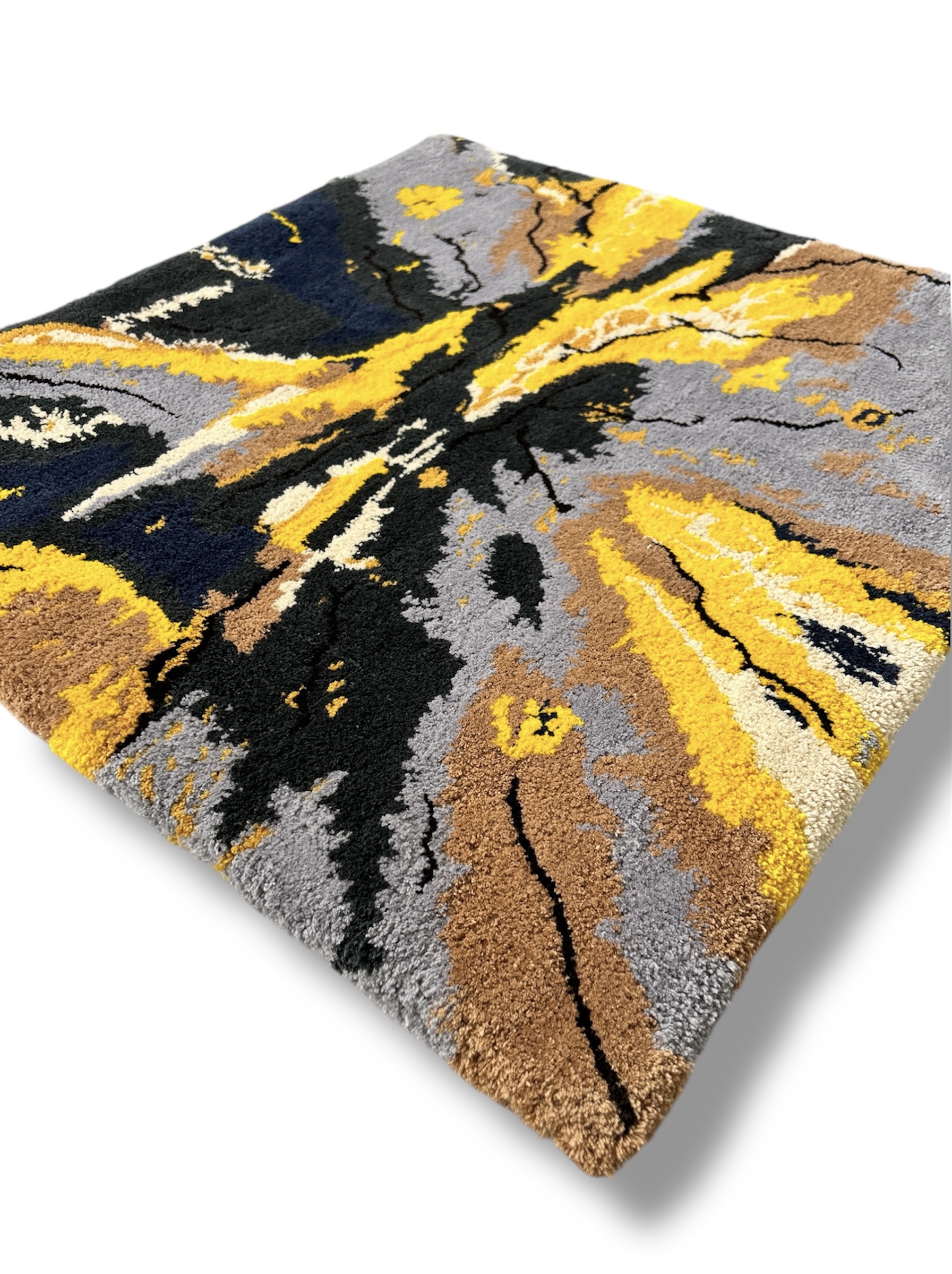 Handmade tufted rug abstract art side view